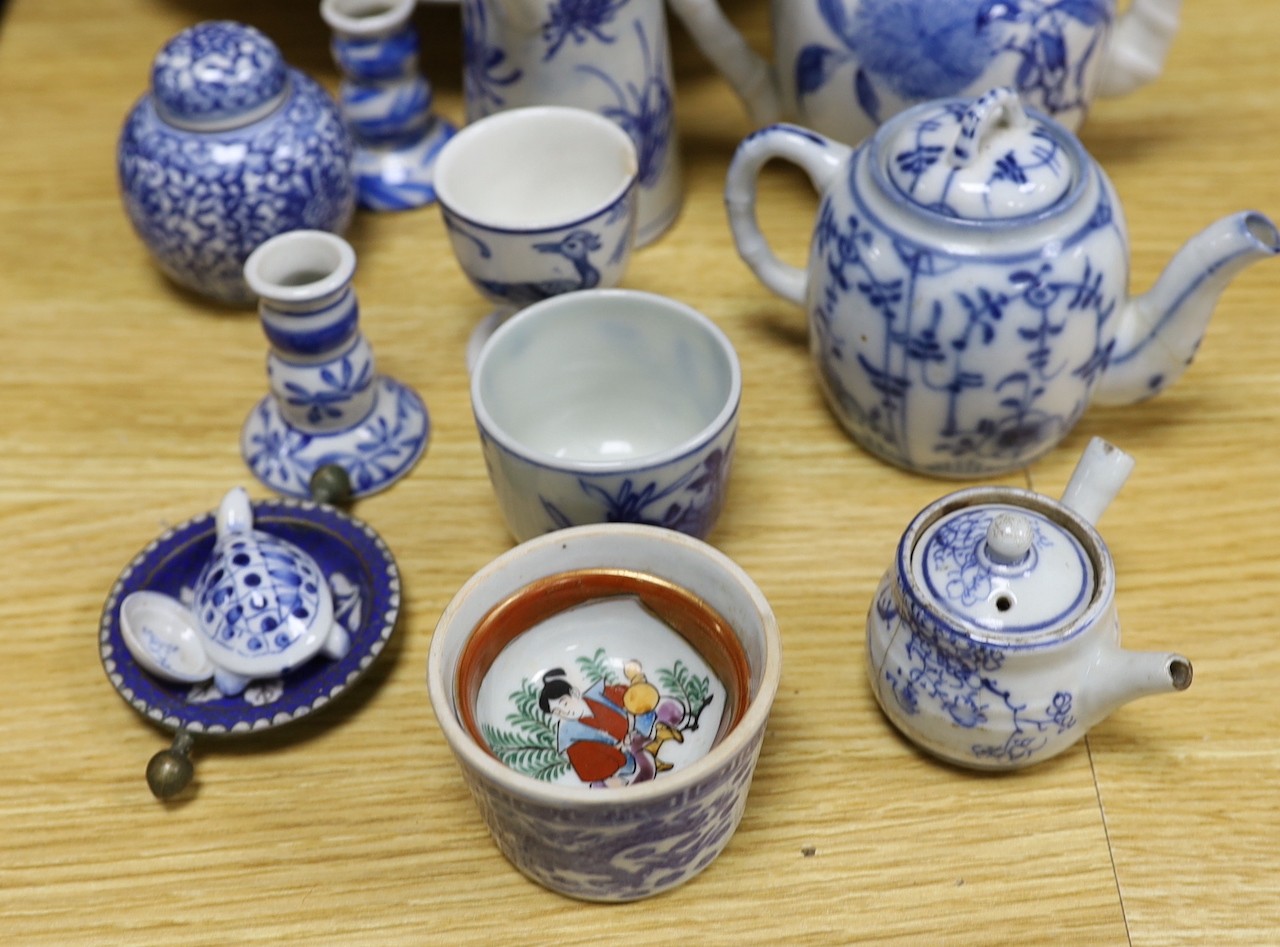 A collection of mostly Japanese blue and white ceramics, late 19th/early 20th century, including a Seto two handle vase, 27 cm high